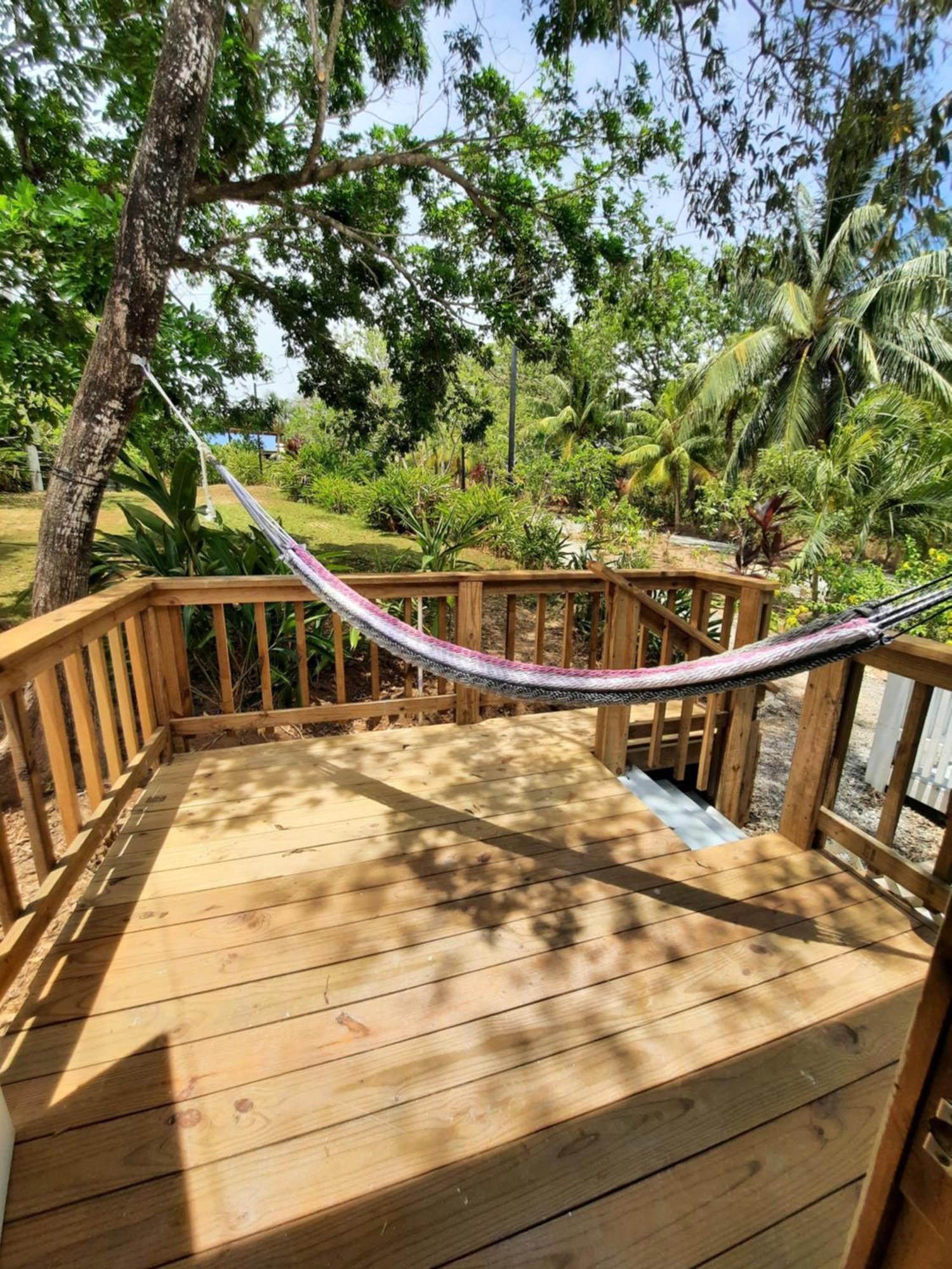 Guava Grove Resort & Villas Sandy Bay Bagian luar foto
