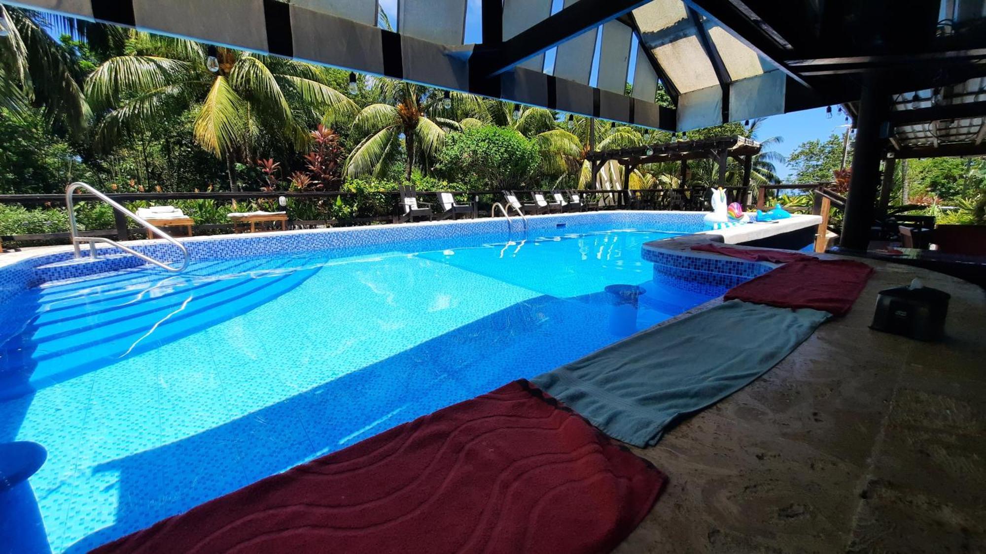 Guava Grove Resort & Villas Sandy Bay Bagian luar foto