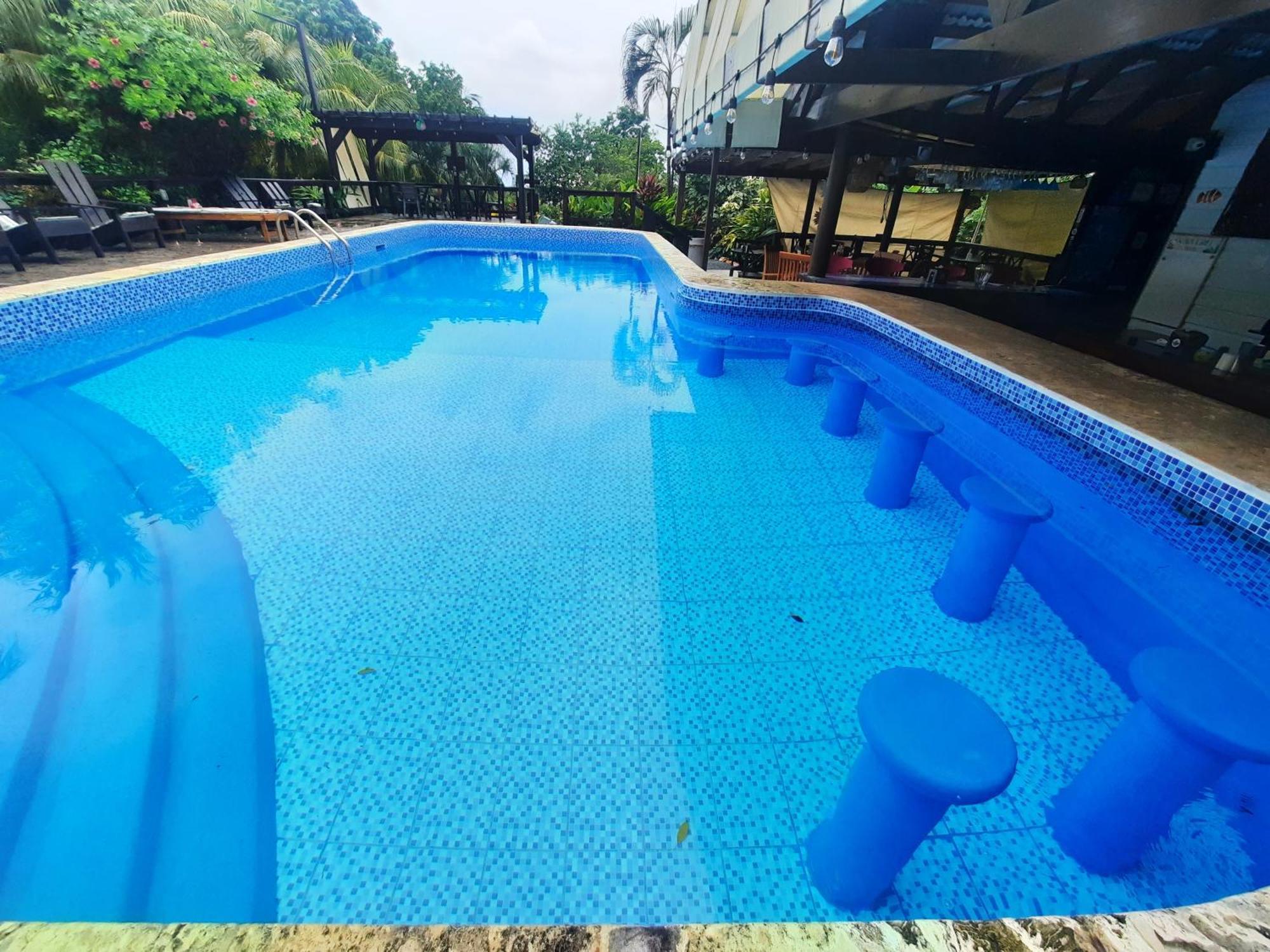 Guava Grove Resort & Villas Sandy Bay Bagian luar foto